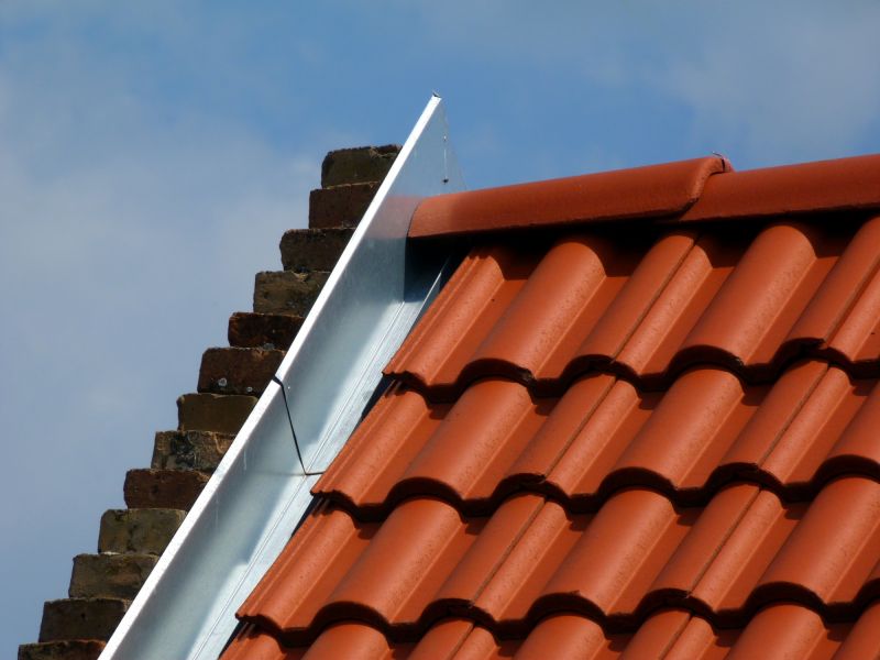 How Roof Flashing Prevents Leaks Around Chimneys And Vents